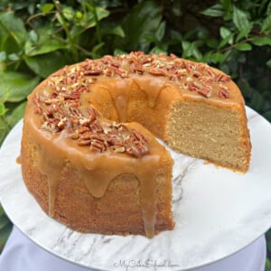 Maple Pound Cake, sliced, on a cake pedestal.