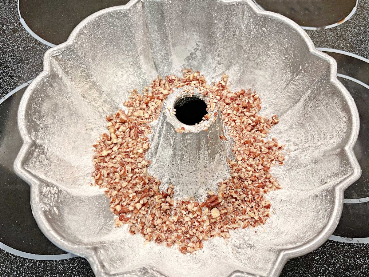 Chopped Pecans in prepared bundt pan.