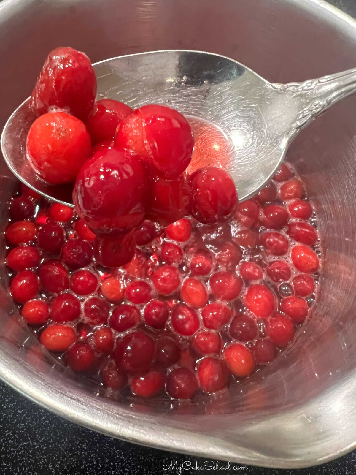 Preparing cranberry filling.