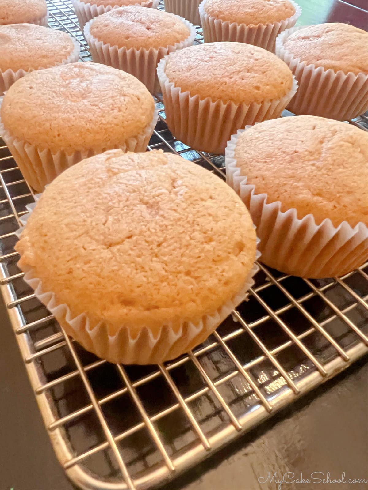 Sweet Potato Cupcakes on a cooling rack.