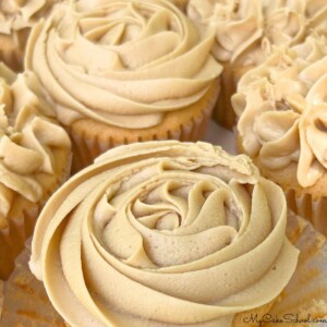 Closeup of Cupcakes topped with caramel frosting.