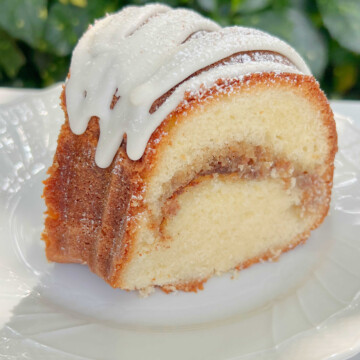 Slice of Snickerdoodle Bundt Cake on a plate.