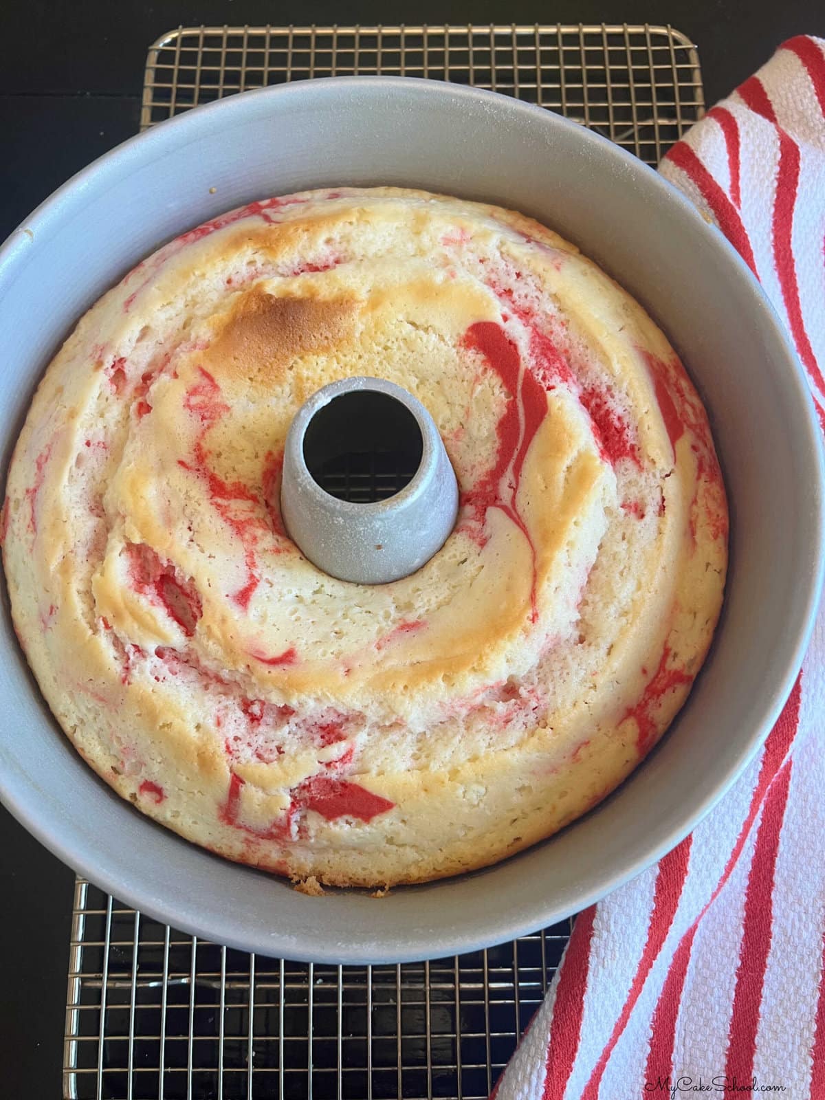 Peppermint Bundt Cake, cooling in pan on a wire rack.