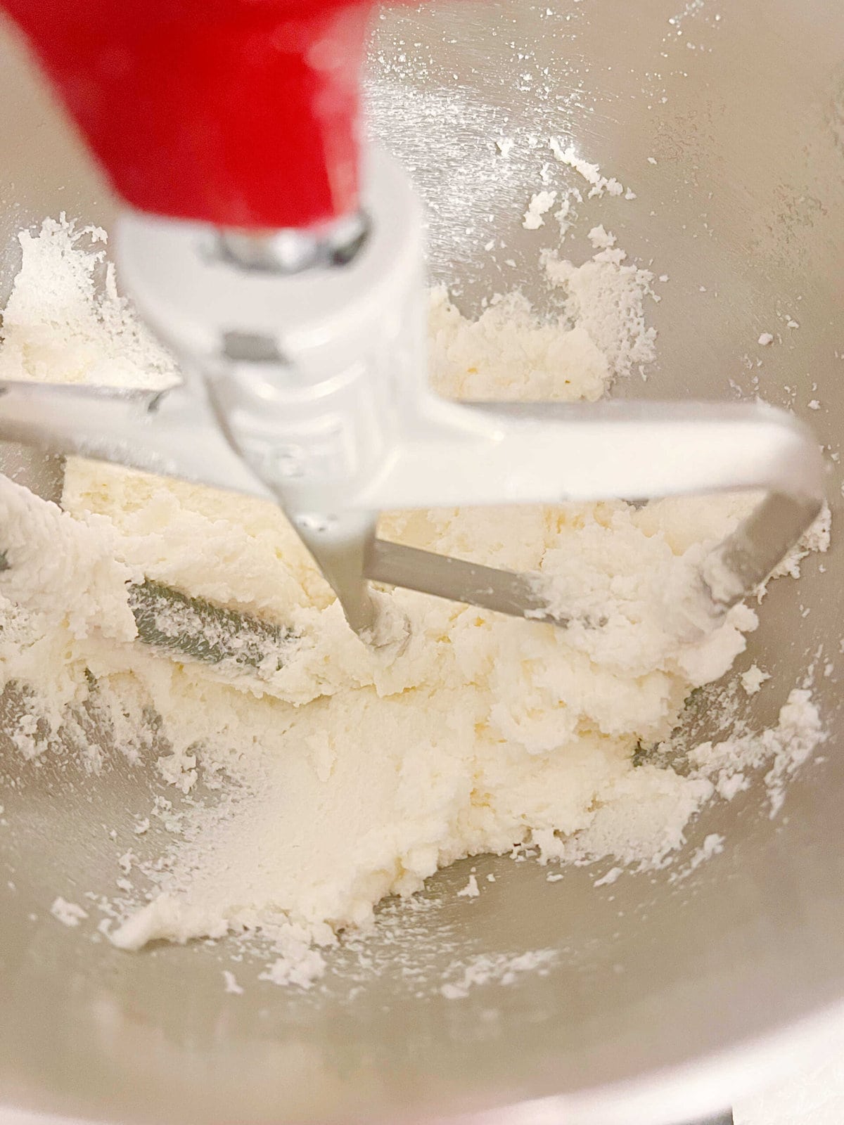 Butter and sugar mixture in mixing bowl.