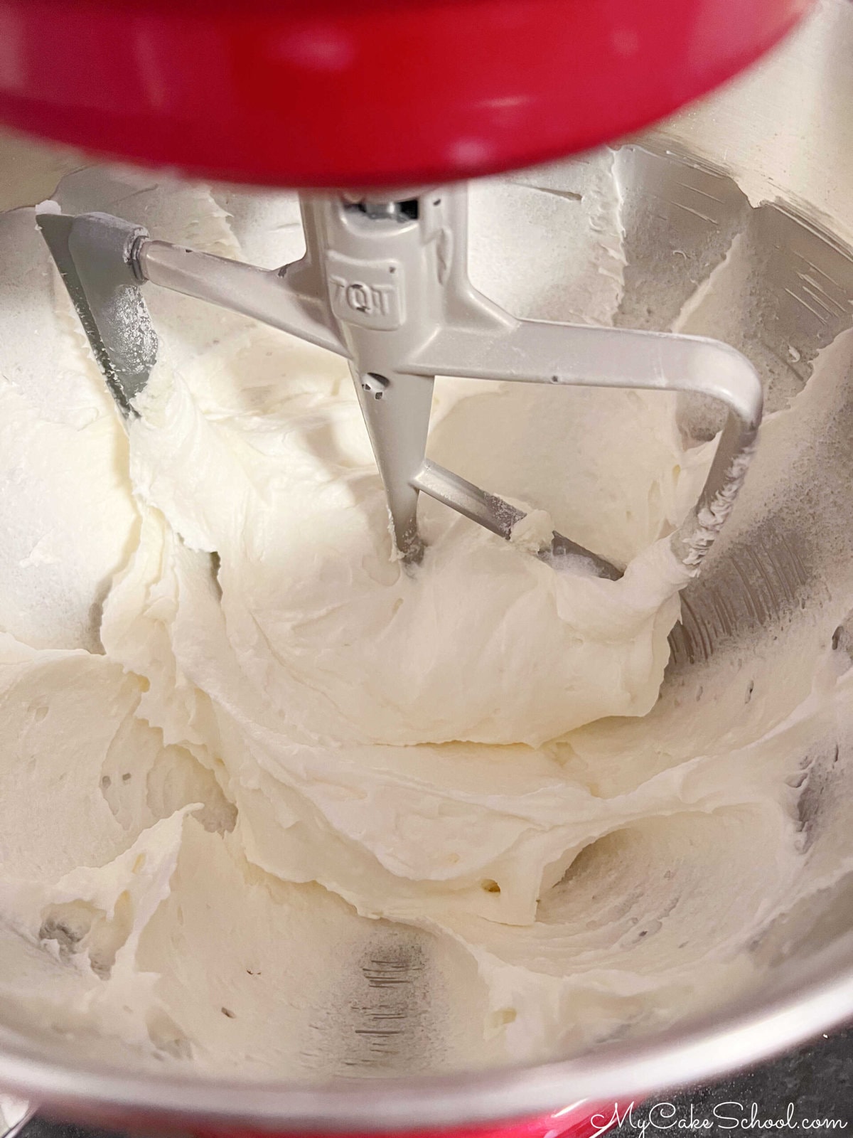 Mixing bowl of cream cheese, butter, and sugar.