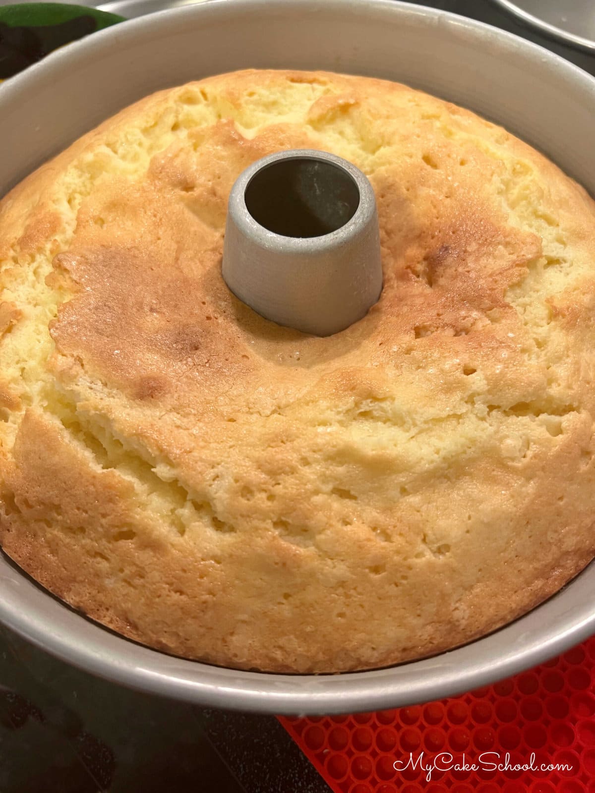 Freshly baked pineapple pound cake in the cake pan.