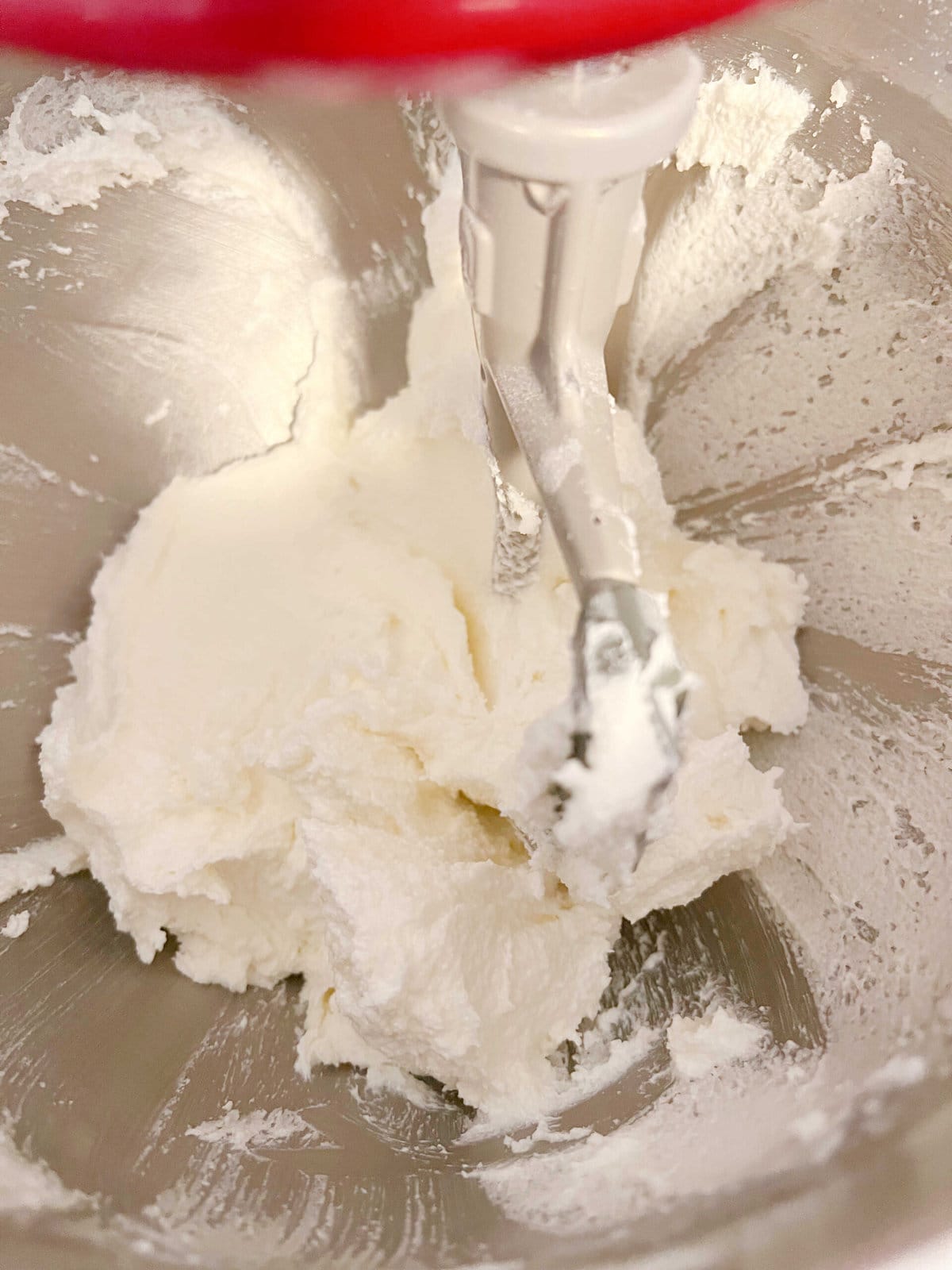 Butter and sugar mixture in a mixing bowl.