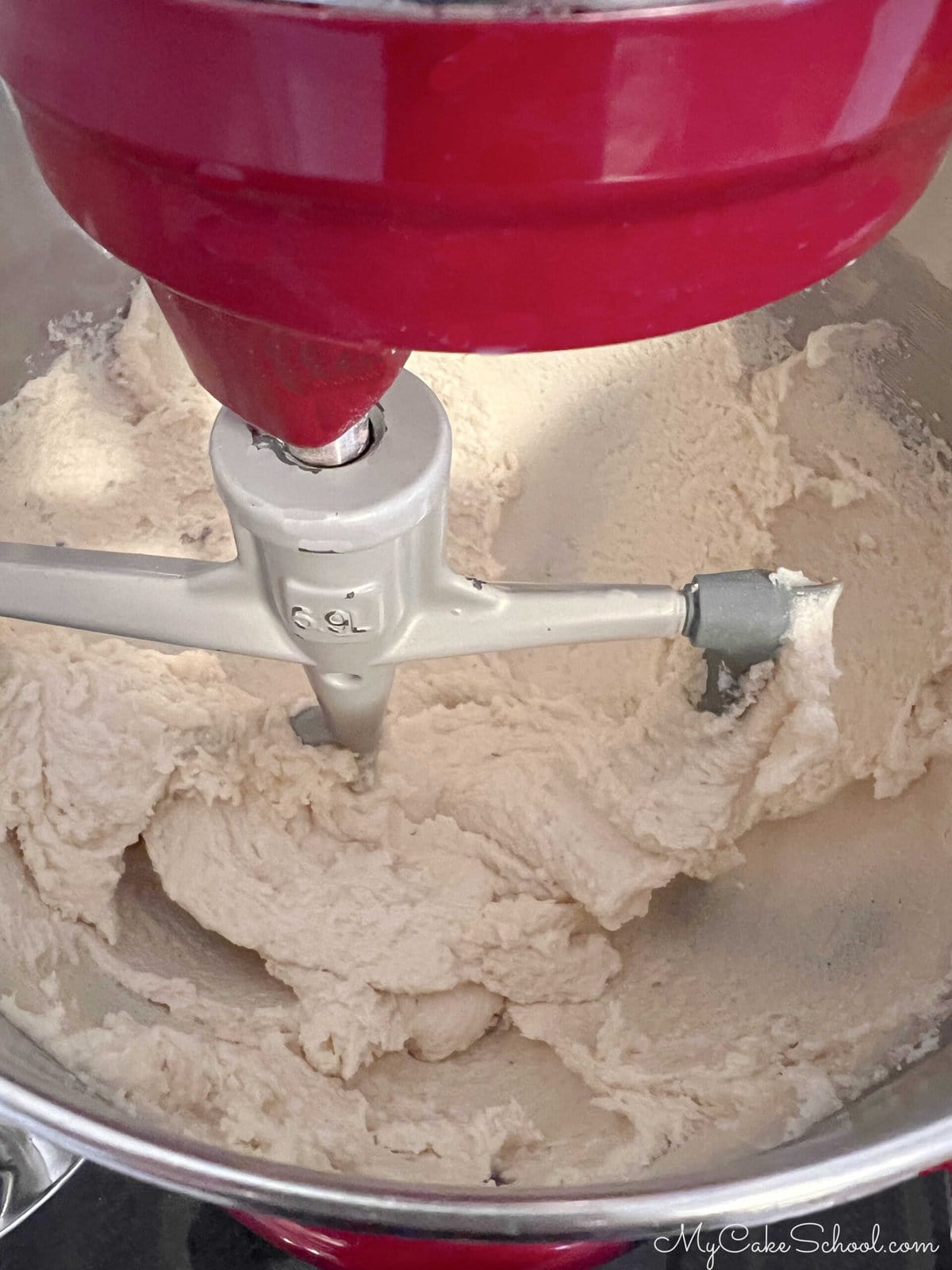 Mixing bowl of batter for caramel eggnog cake.