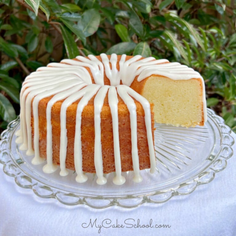 Five Flavor Pound Cake, sliced, on a pedestal.