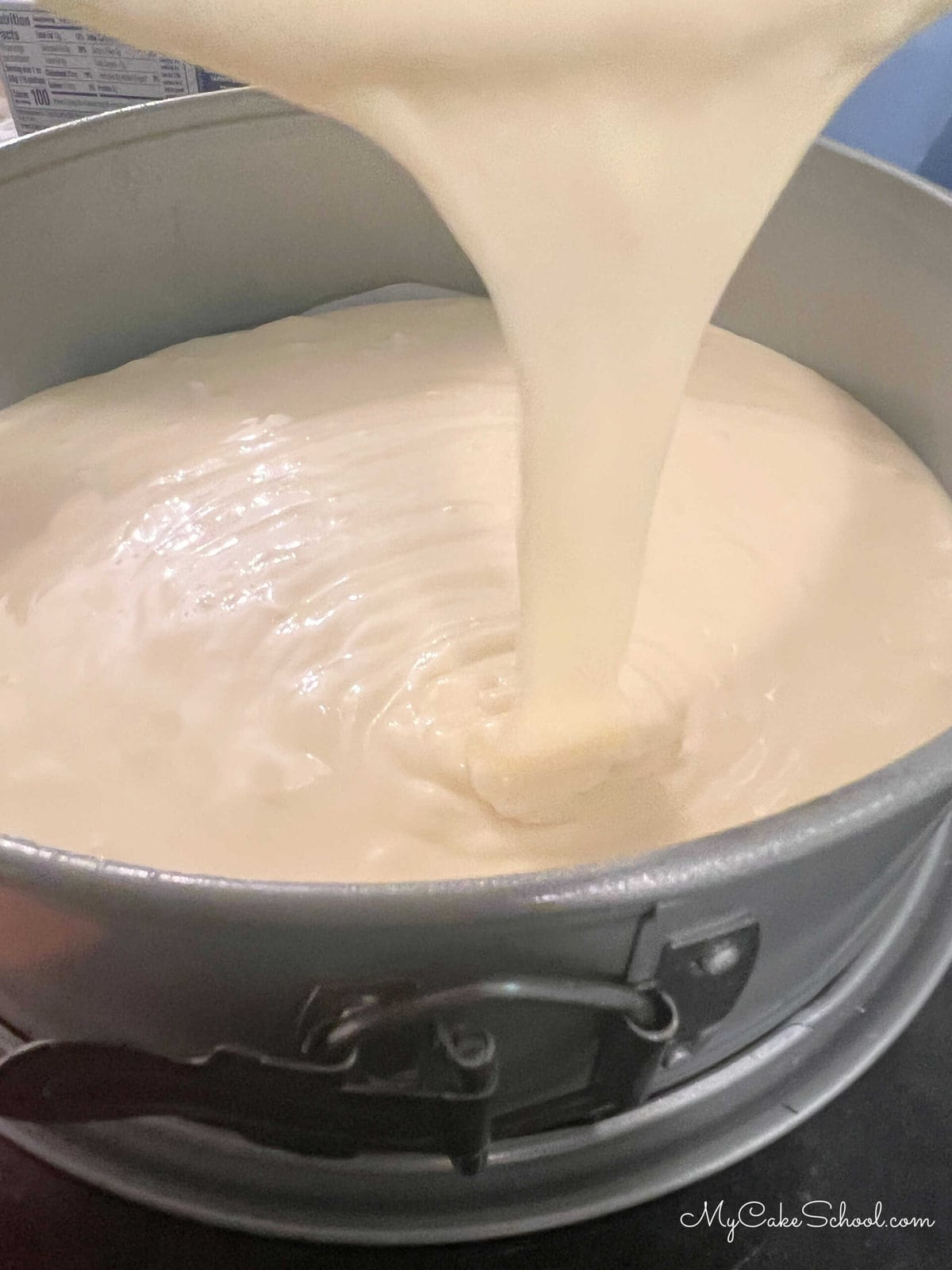 Pouring the Cheesecake Batter into springform pan.