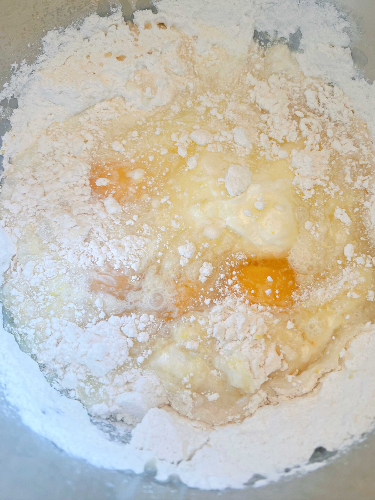 Ingredients in mixing bowl for Limoncello Bundt Cake.