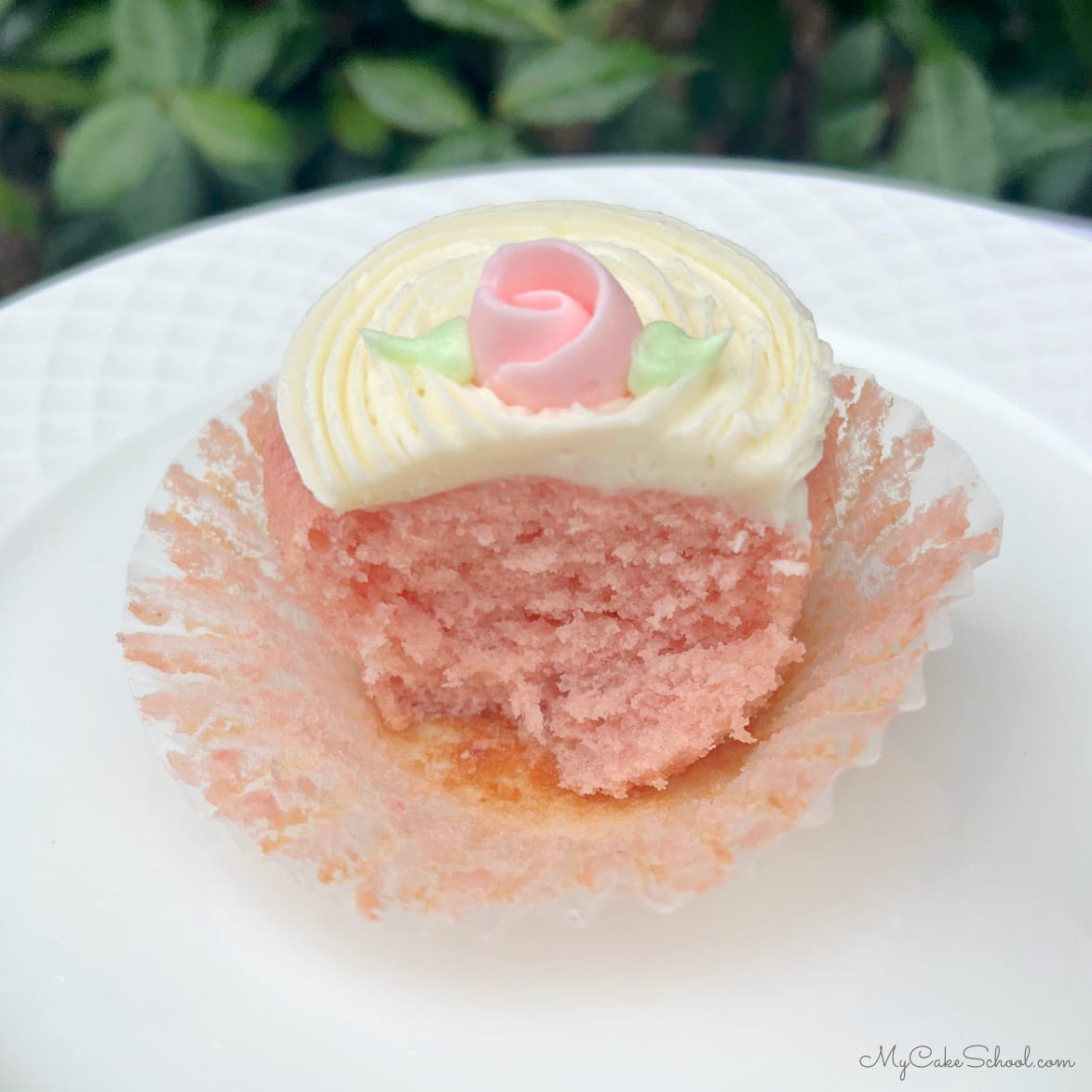 Strawberry Cupcake with liner peeled away.