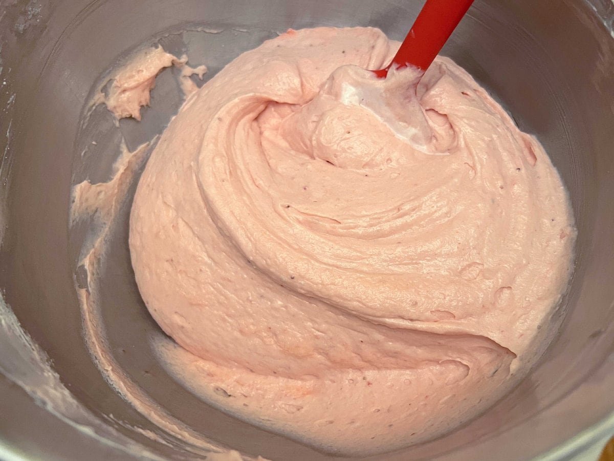Batter for strawberry sour cream cake in mixing bowl.