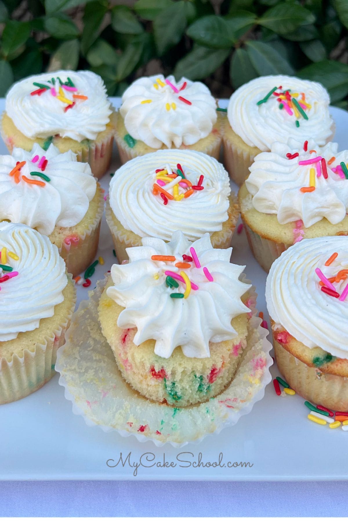 Funfetti Cupcakes from Scratch on a cake platter.