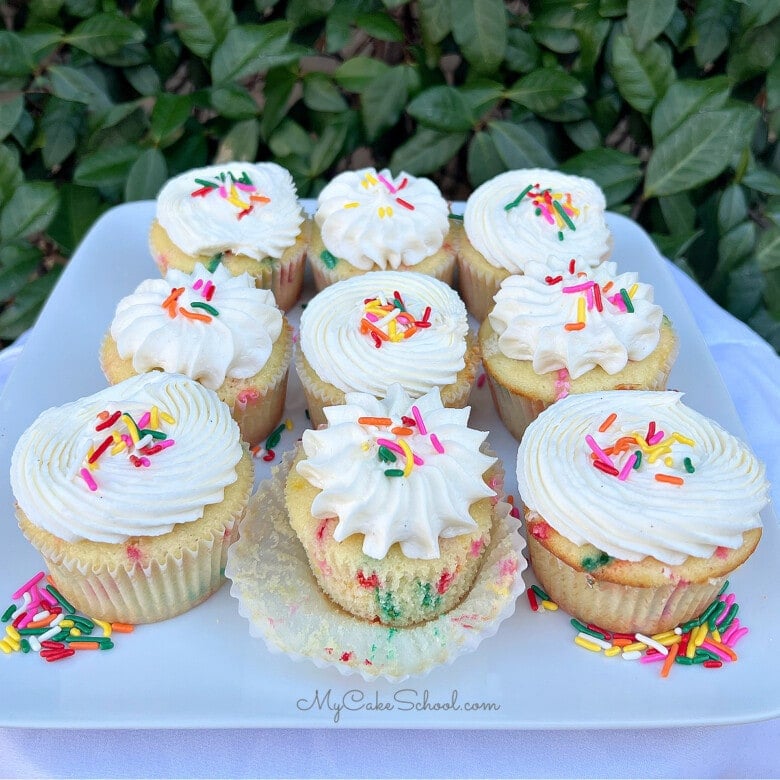 Funfetti Cupcakes on a cake platter.