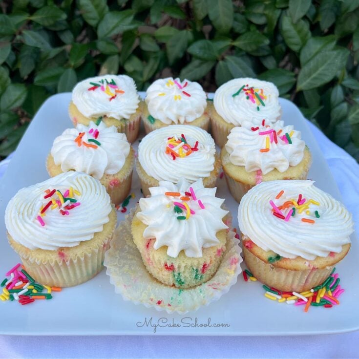 Funfetti Cupcakes on a cake platter.