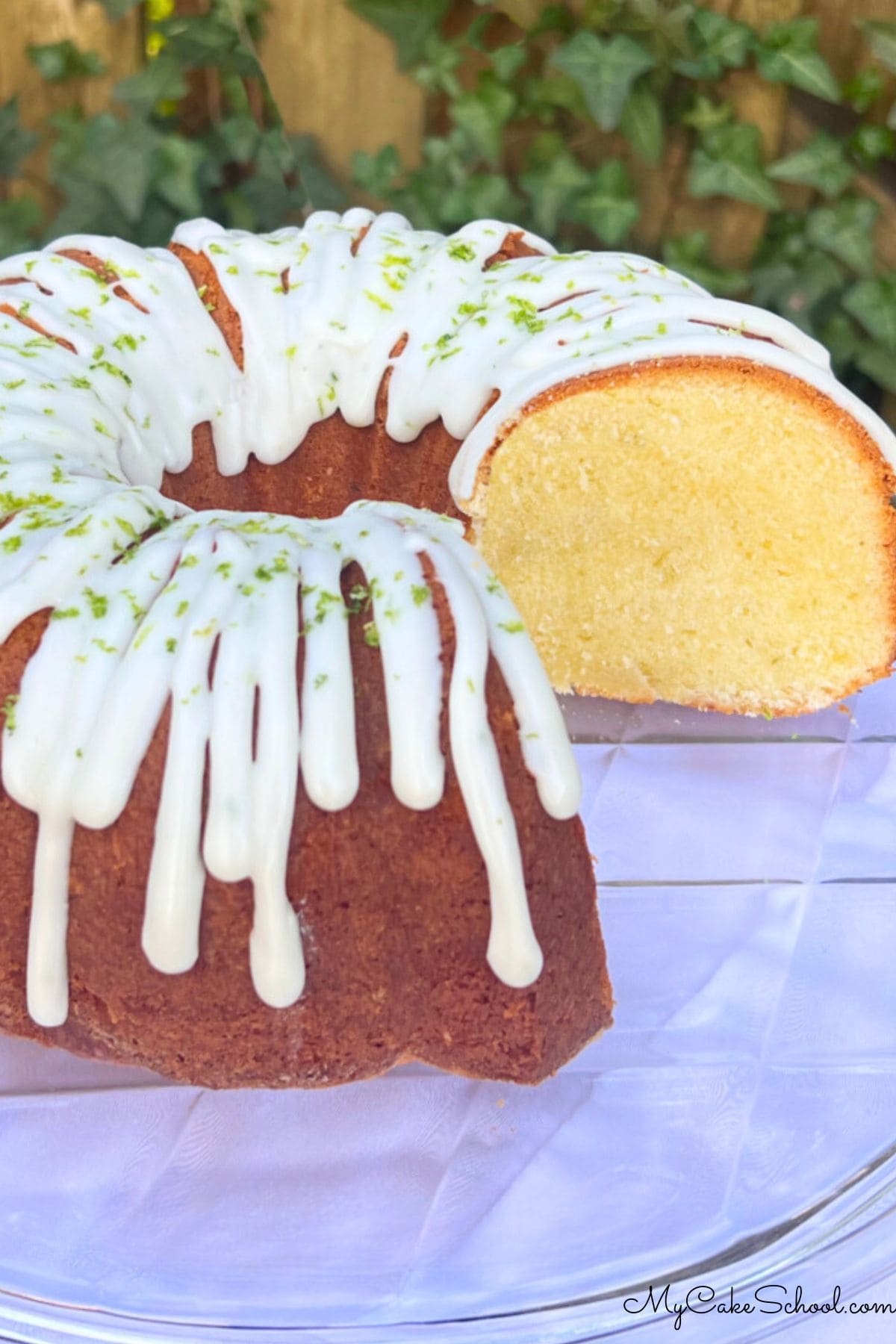 Key Lime Pound Cake on a cake pedestal.