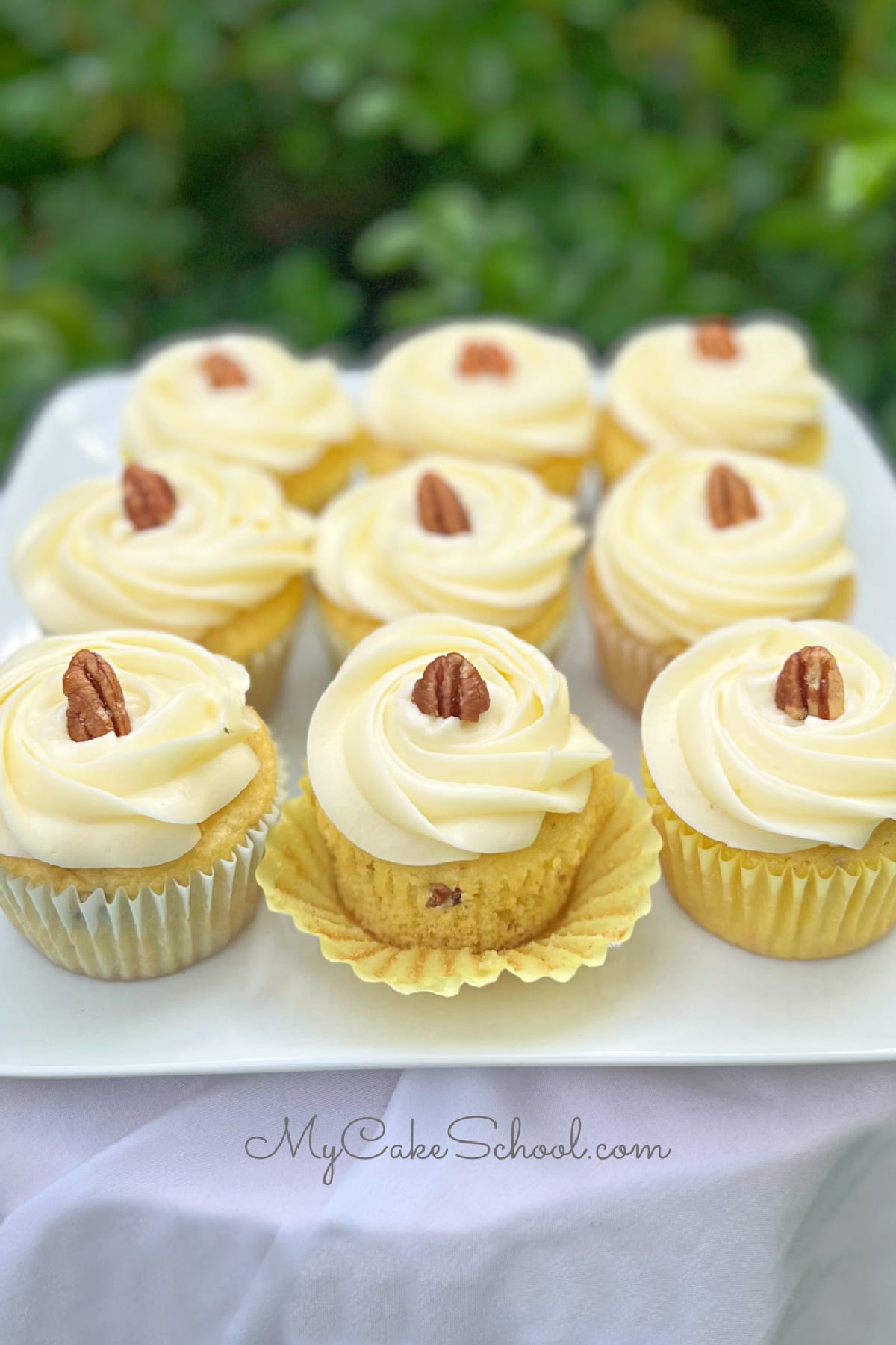 Italian Cream Cupcakes on a platter.