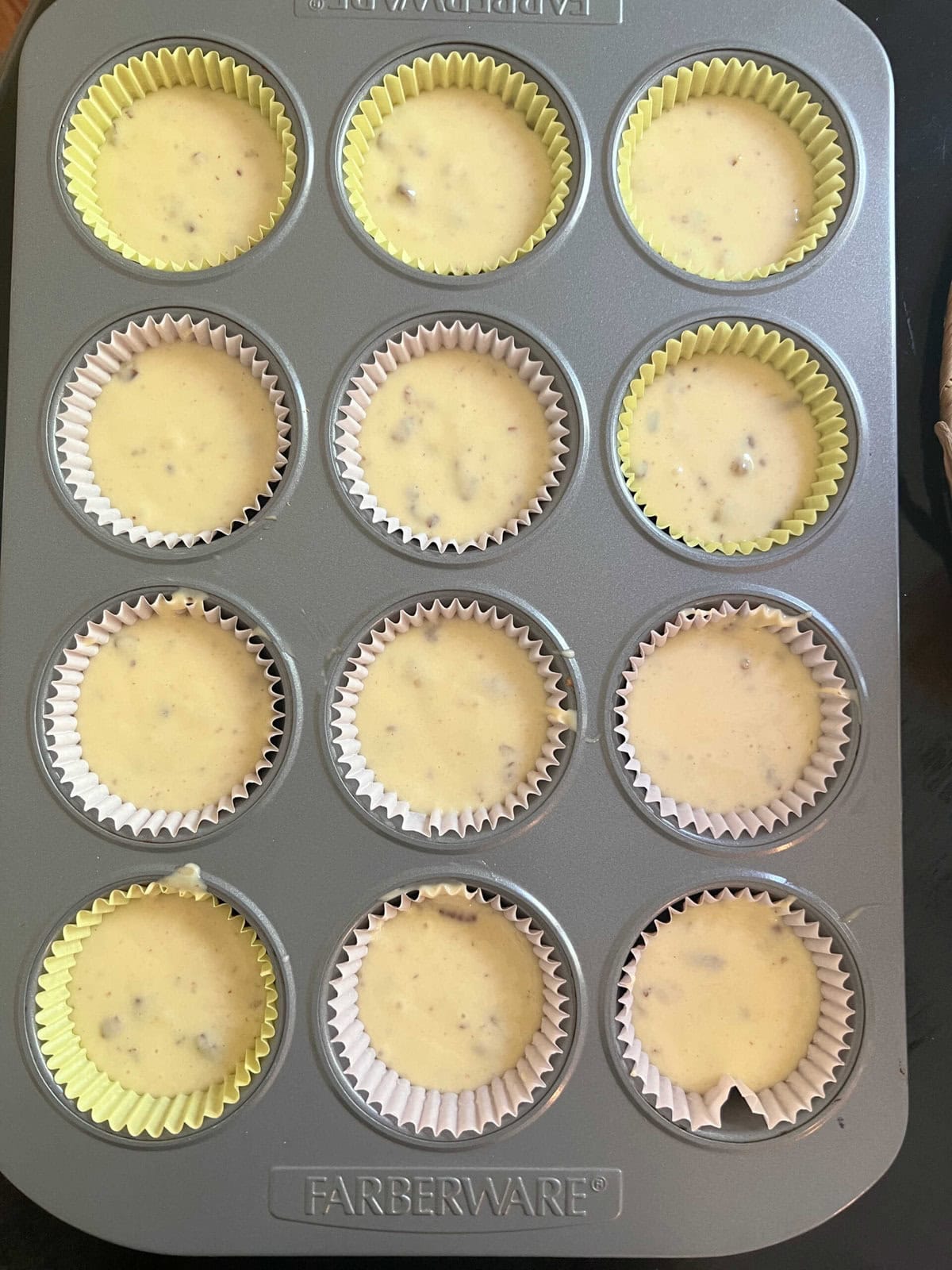 Butter Pecan Cupcake Batter in the cupcake pan.