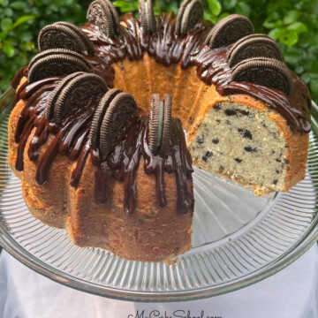 Oreo Pound Cake on a pedestal.