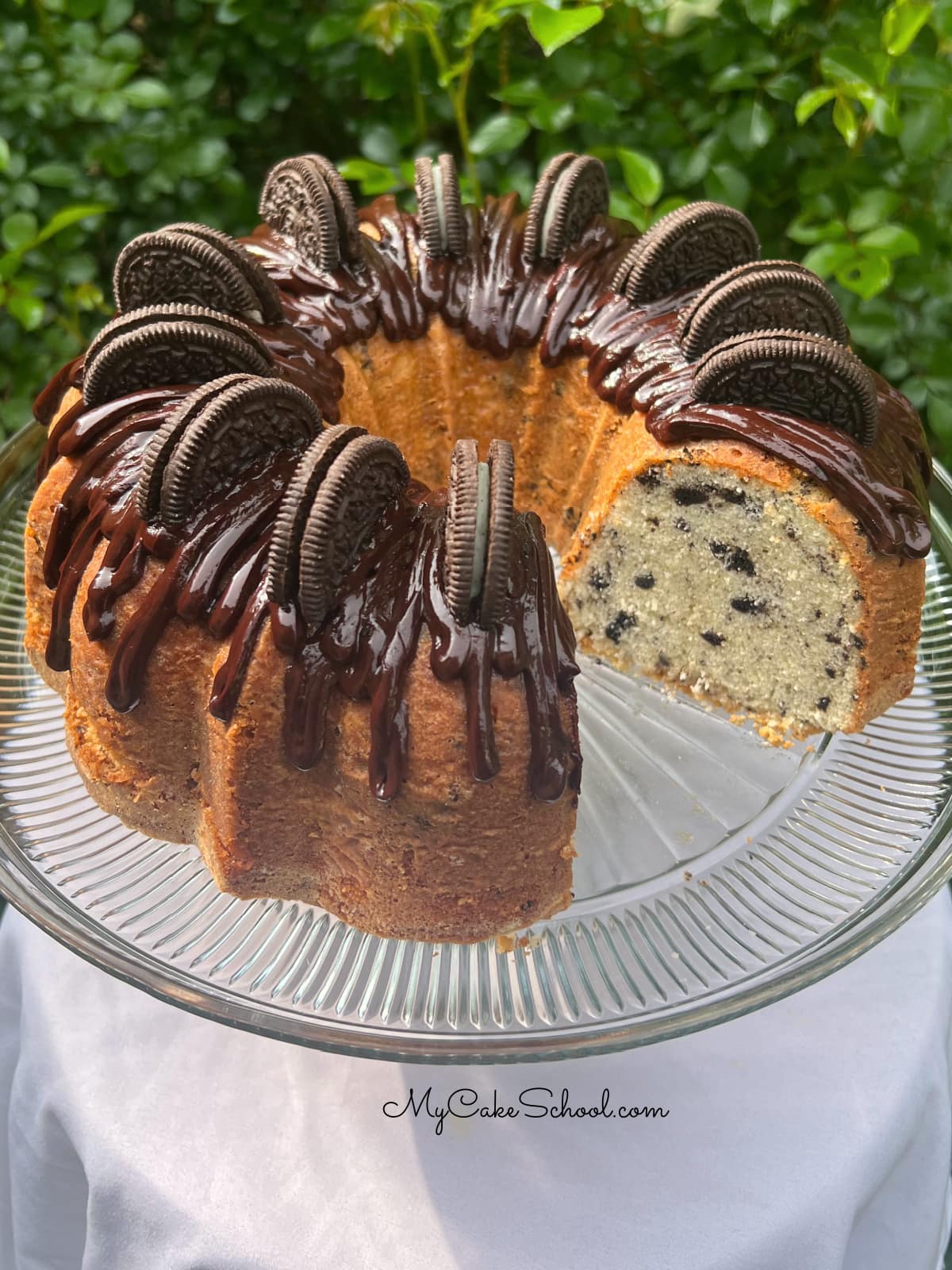 Oreo Pound Cake on a pedestal.