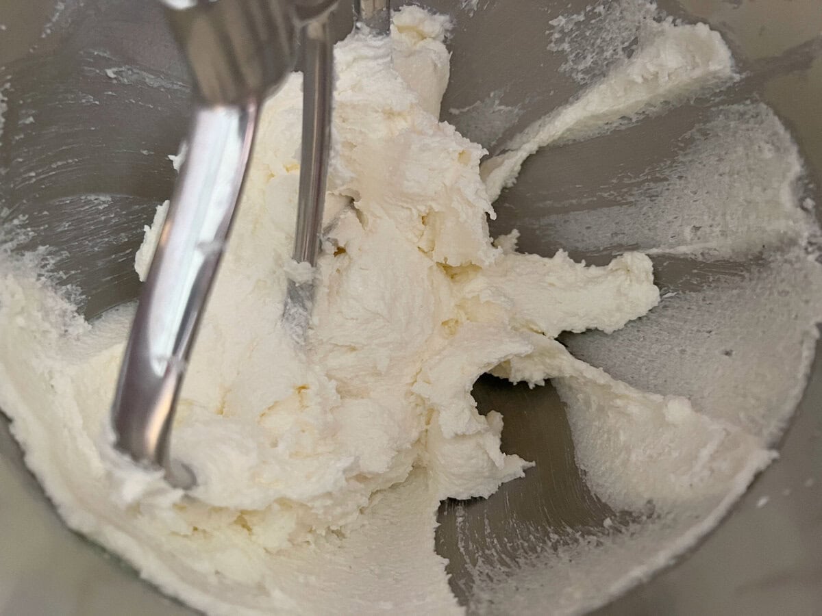 Mixing butter and sugar.
