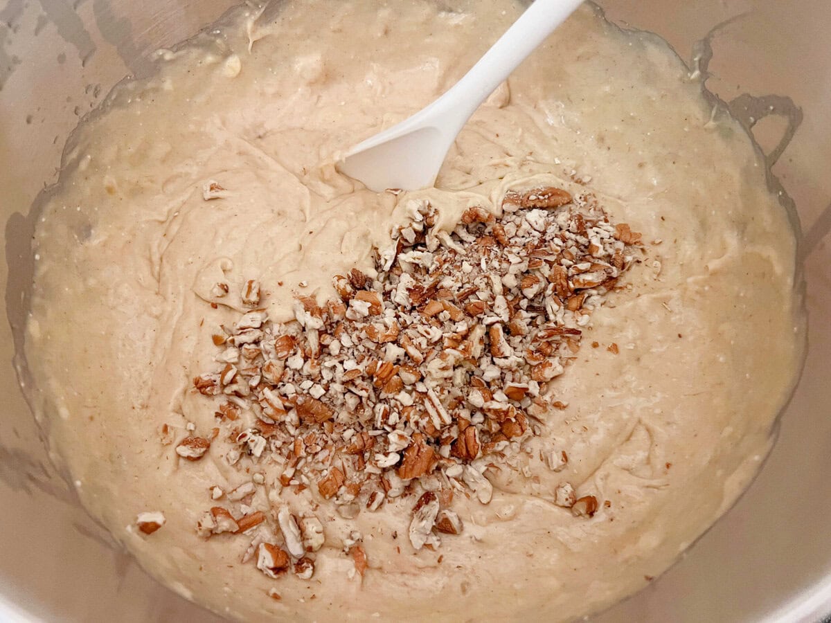 Hummingbird cupcake batter with pecans.