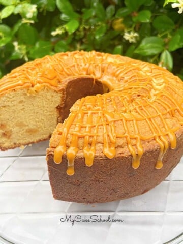 Butterscotch Pound Cake, sliced, on a cake plate.