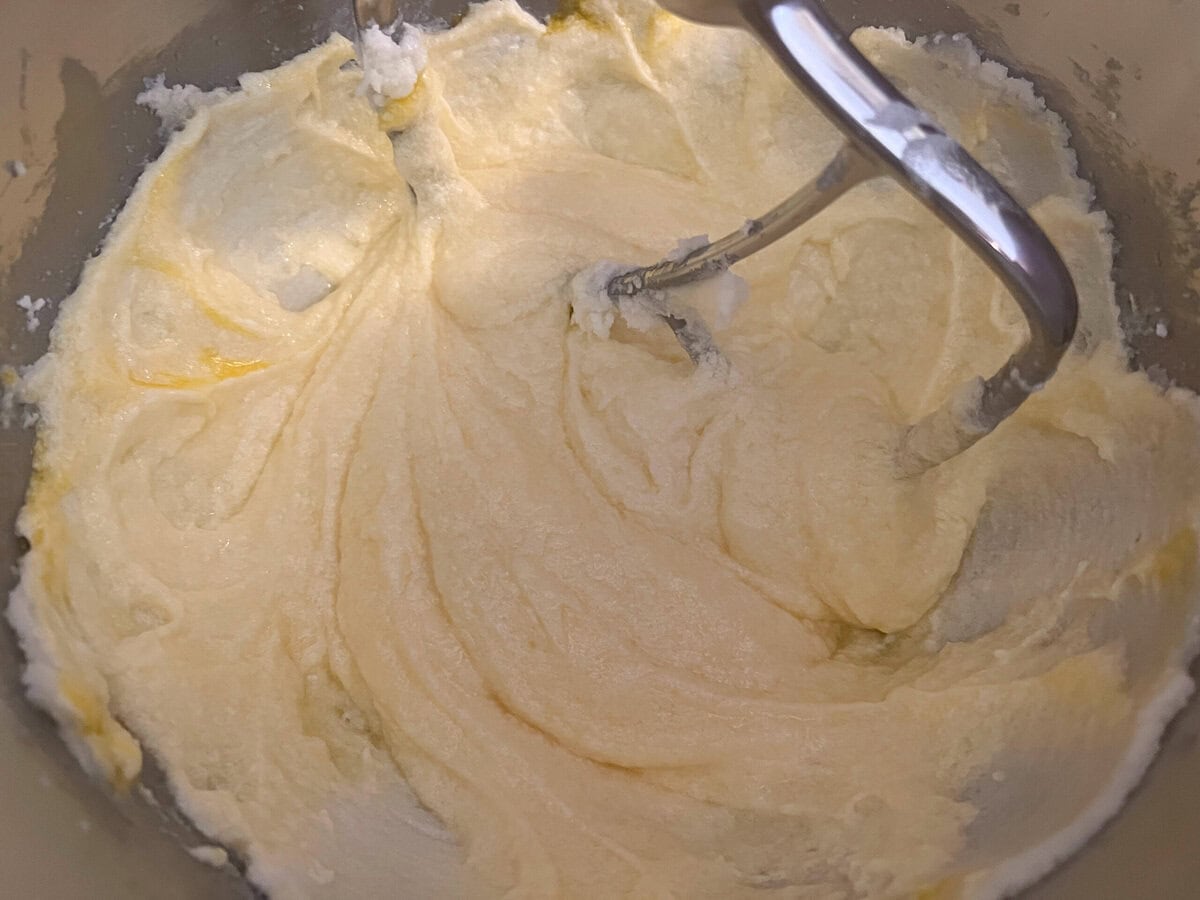 Mixing eggs into cake batter.