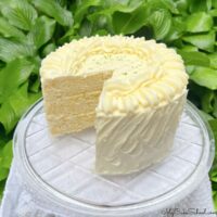 Lime Velvet Cake, sliced, on a cake plate.