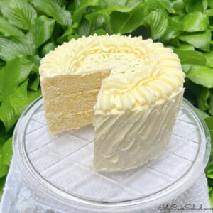Lime Velvet Cake, sliced, on a cake plate.