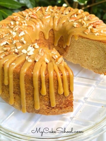 Brown Sugar Pound Cake, sliced, on a cake plate.
