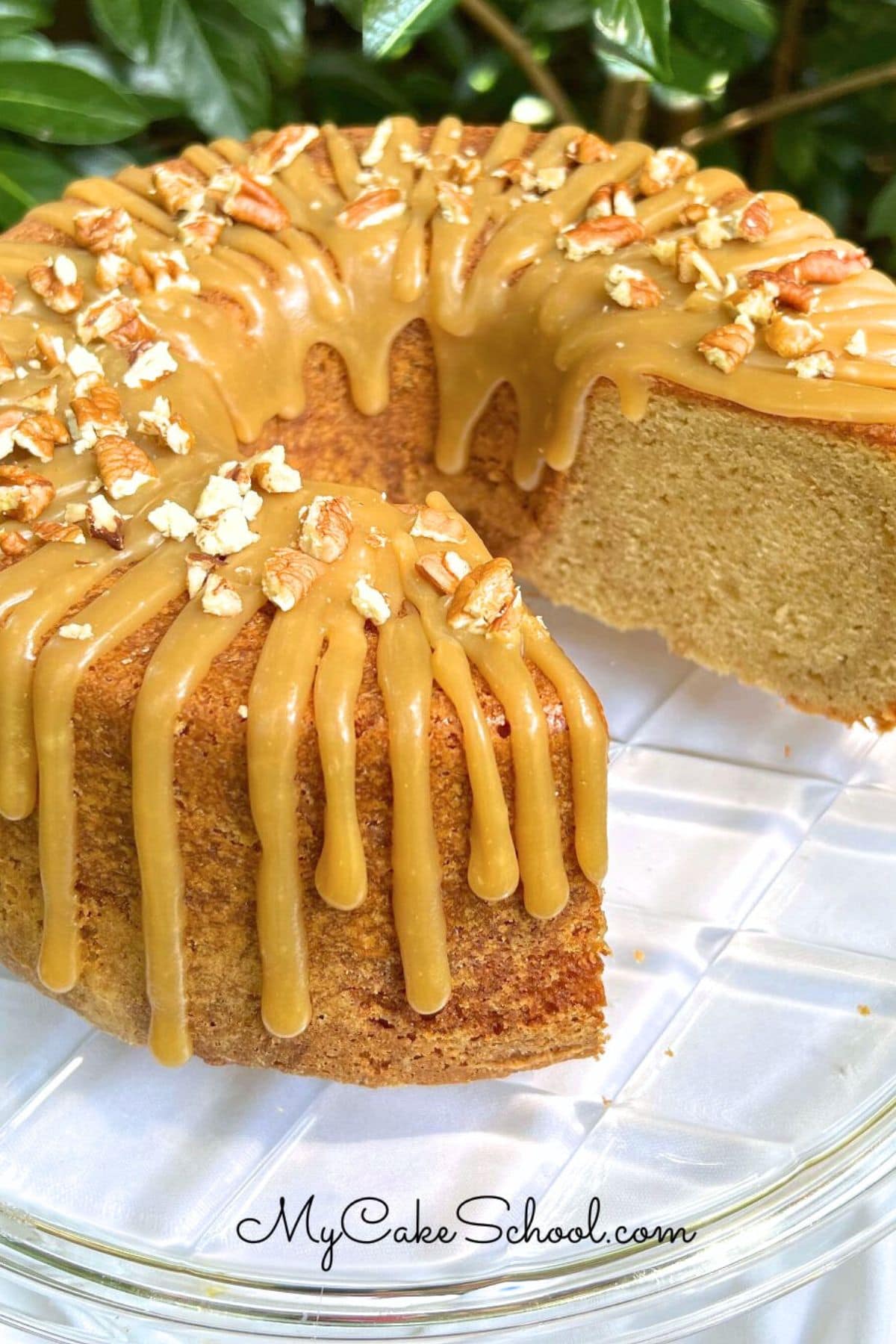 Sliced Brown Sugar Pound Cake on a cake plate.