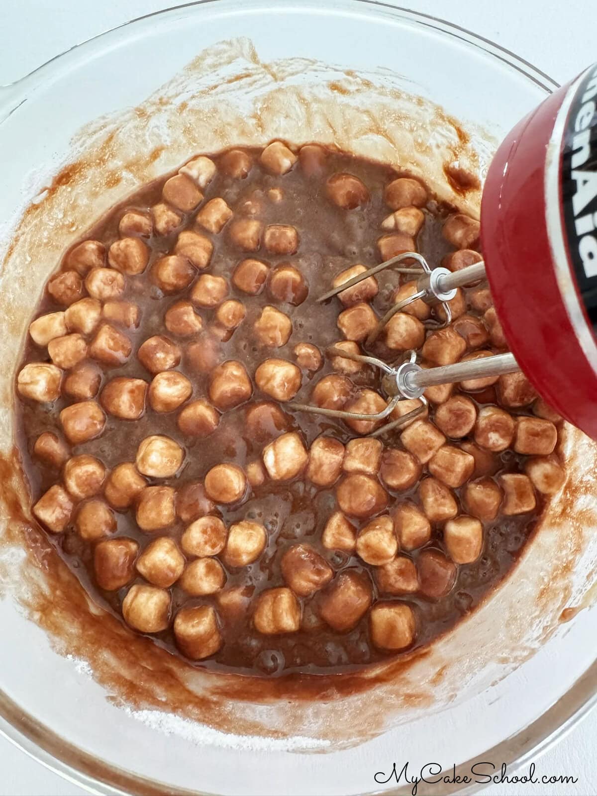 Mixing batter for the Coca Cola Cake.