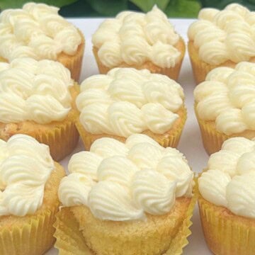 Pineapple Cupcakes on a cake plate.