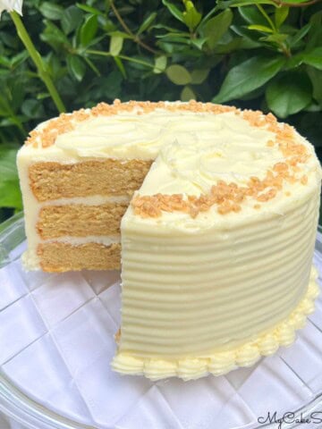 Sliced Brown Sugar Toffee Cake on a cake plate.