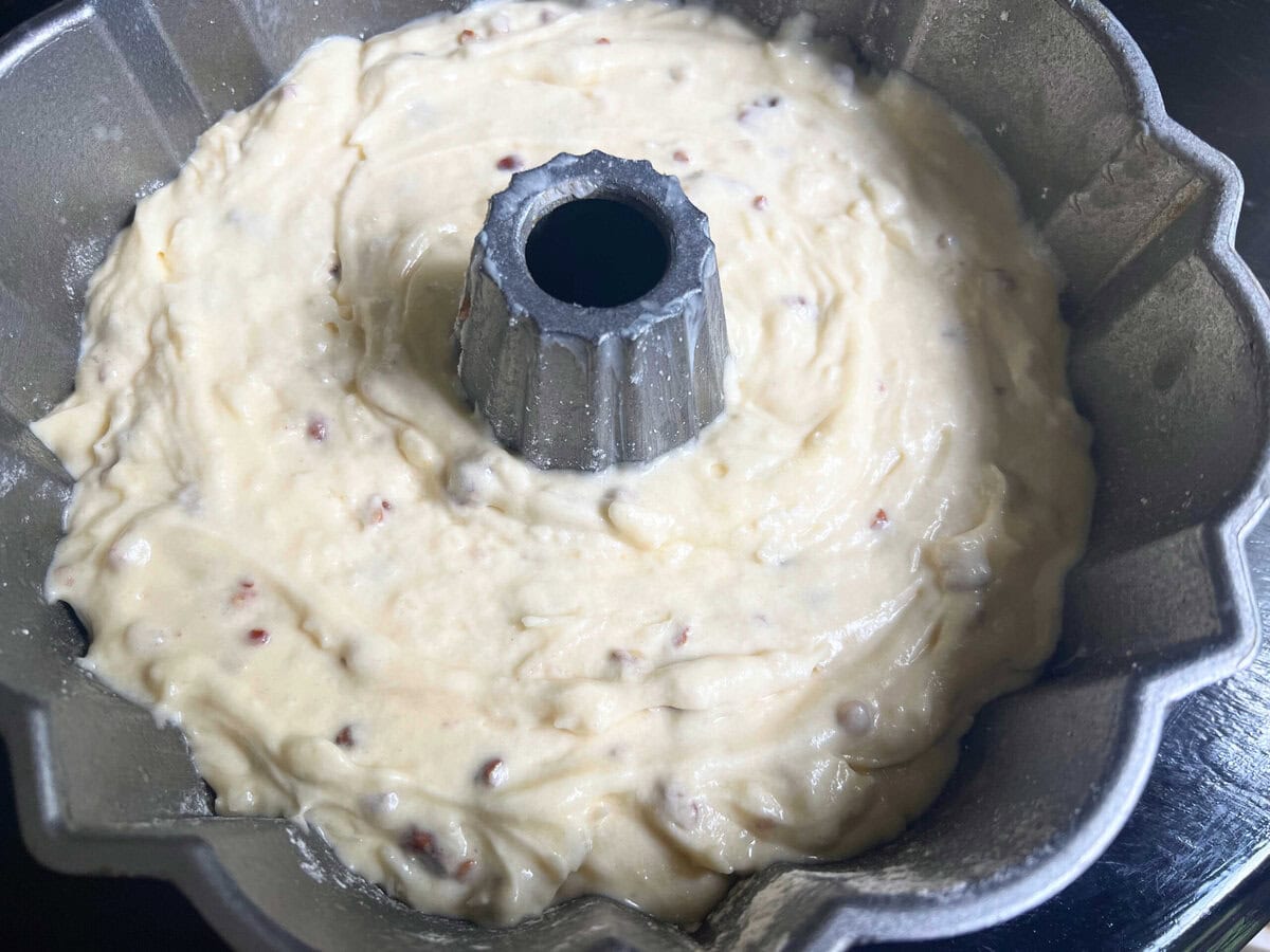 Coconut Pecan Cake Batter in bundt pan.