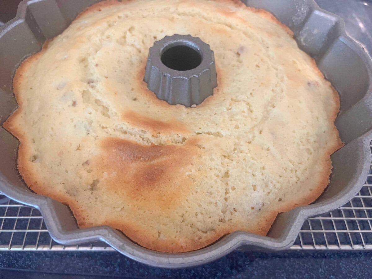 Coconut Pecan Bundt Cake, freshly baked and cooling.