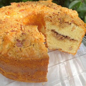Coffee Cake pound cake, sliced, on a pedestal.