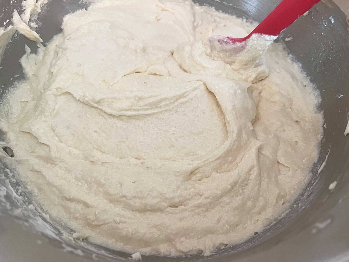 Buttermilk pound cake batter in a mixing bowl.