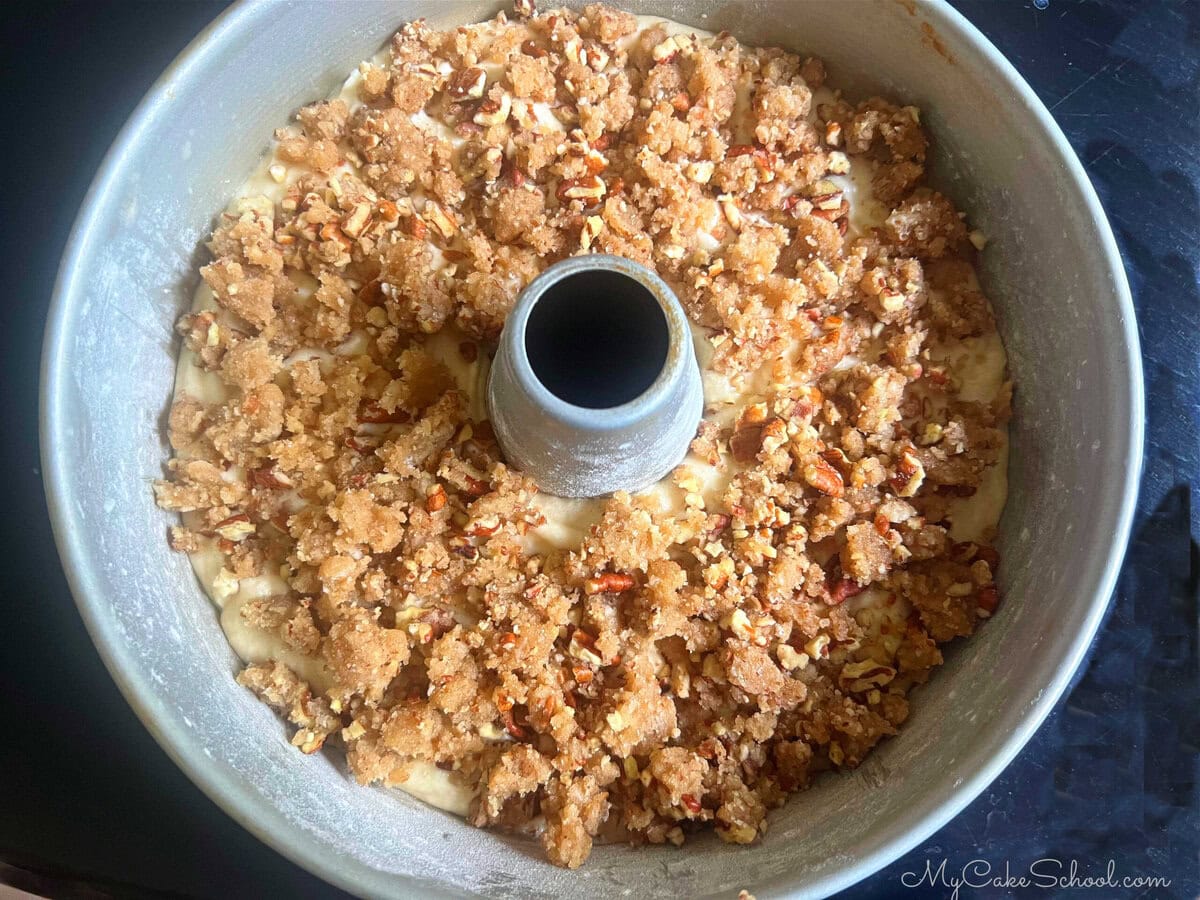 The filled bundt cake pan, ready for baking.