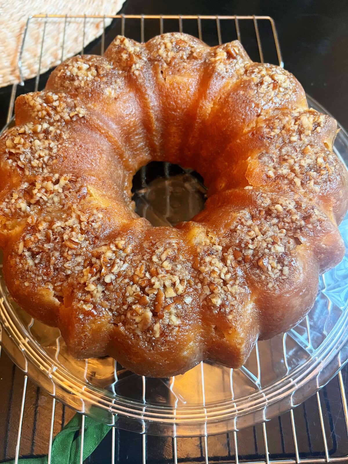 Apple Rum Cake on a cake plate.