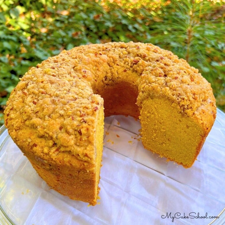 Pumpkin Pound Cake, sliced, on a cake plate.