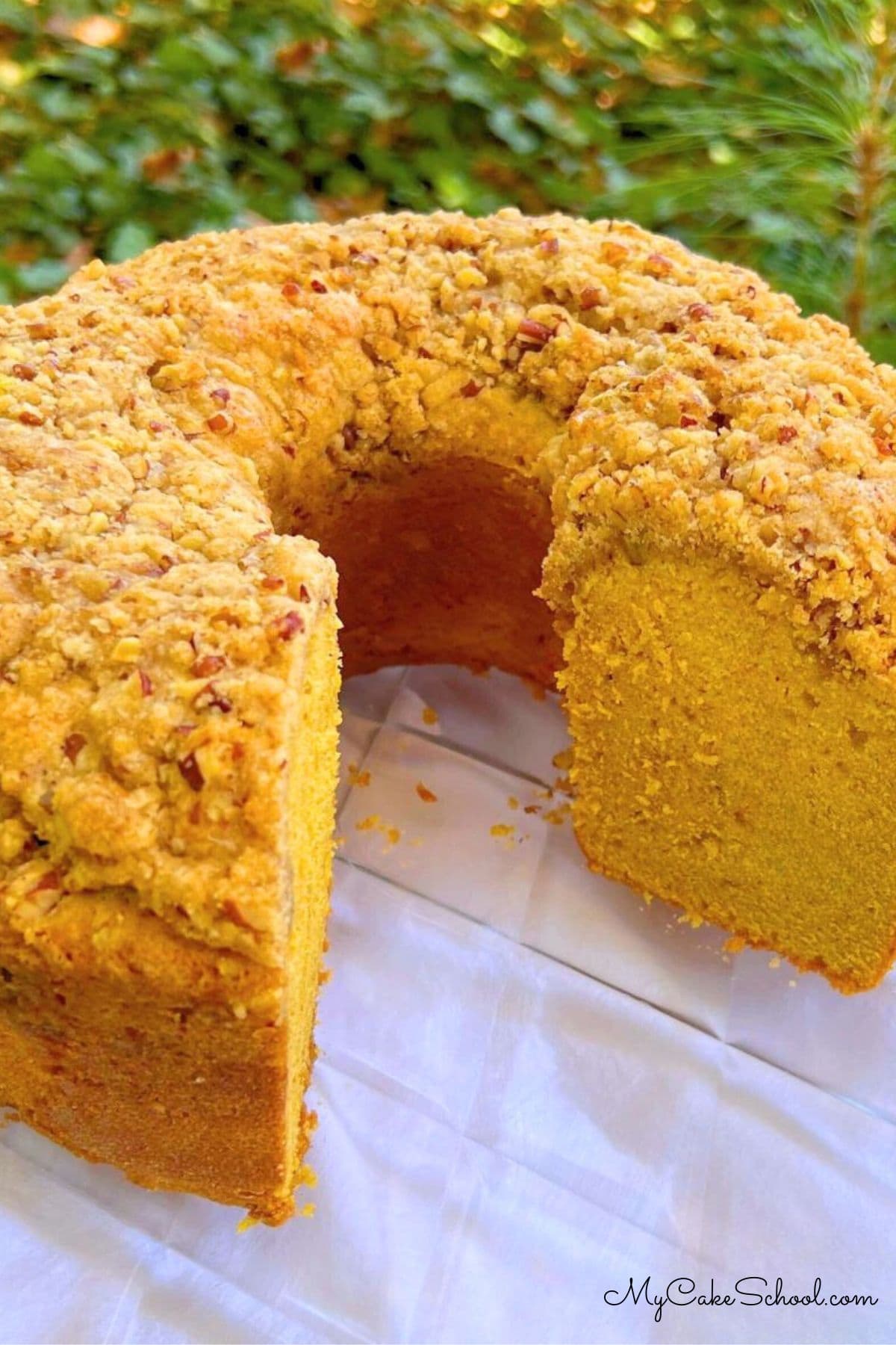 Pumpkin Pound Cake, sliced, on a cake plate.