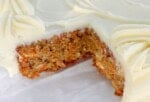 Carrot Sheet Cake, sliced, on a cake plate.