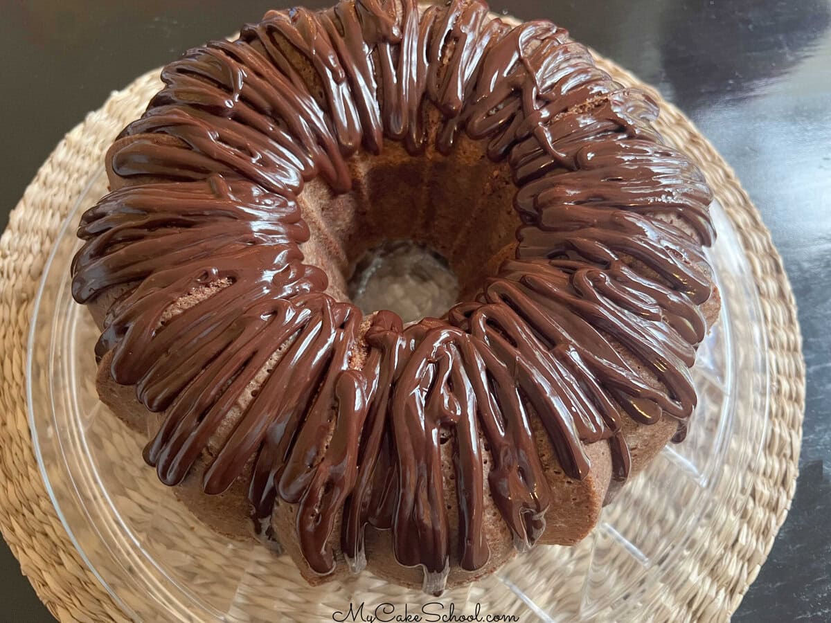 Cake drizzled with chocolate ganache.