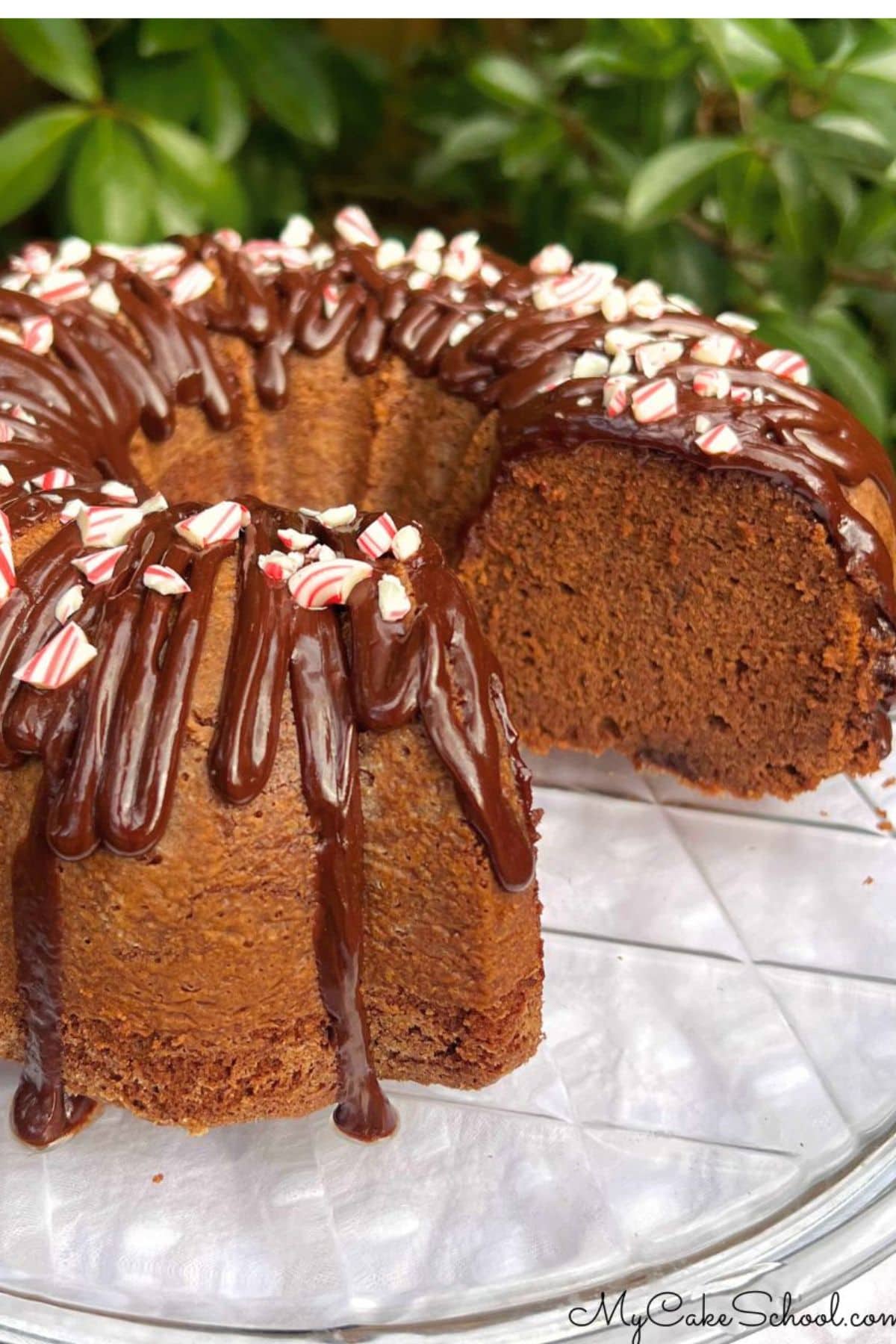 Chocolate Peppermint Pound Cake, sliced, on a cake plate.