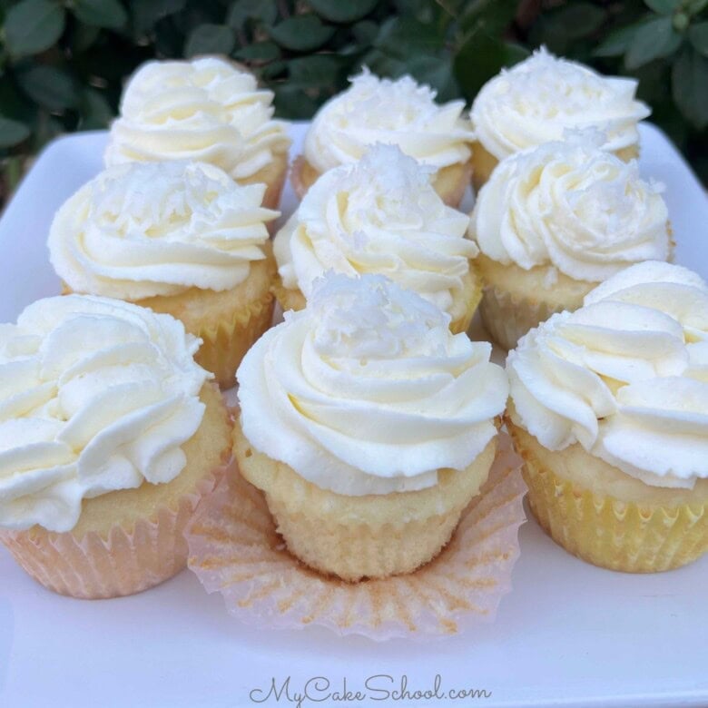 Coconut Cupcakes on a platter.