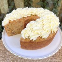 Carrot Pound Cake, sliced, on a pedestal.