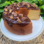Peanut Butter Pound Cake, sliced, on a cake pedestal.